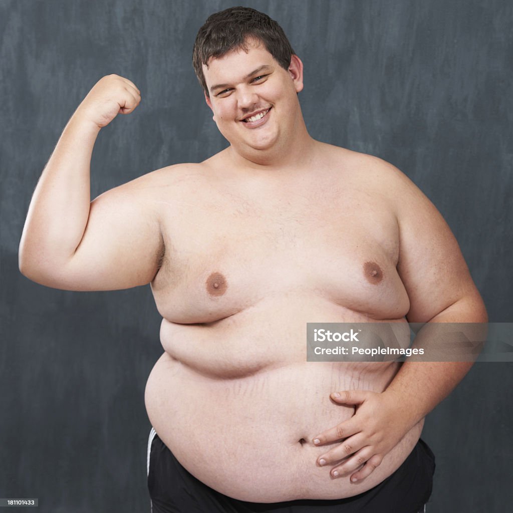 overweight young man showing the weight loss plateau