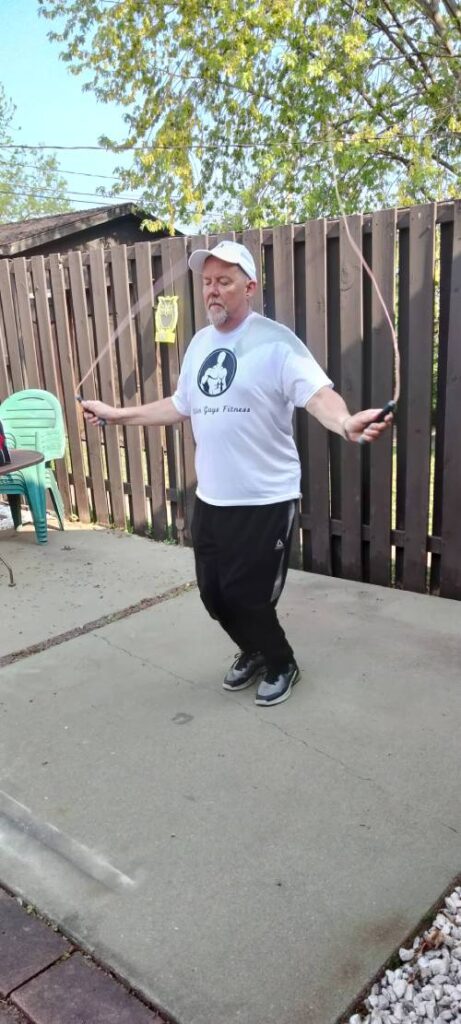 fitness coach will levin jumping rope during HIIT workout